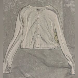 Cream long sleeve button up shirt. SIZE M